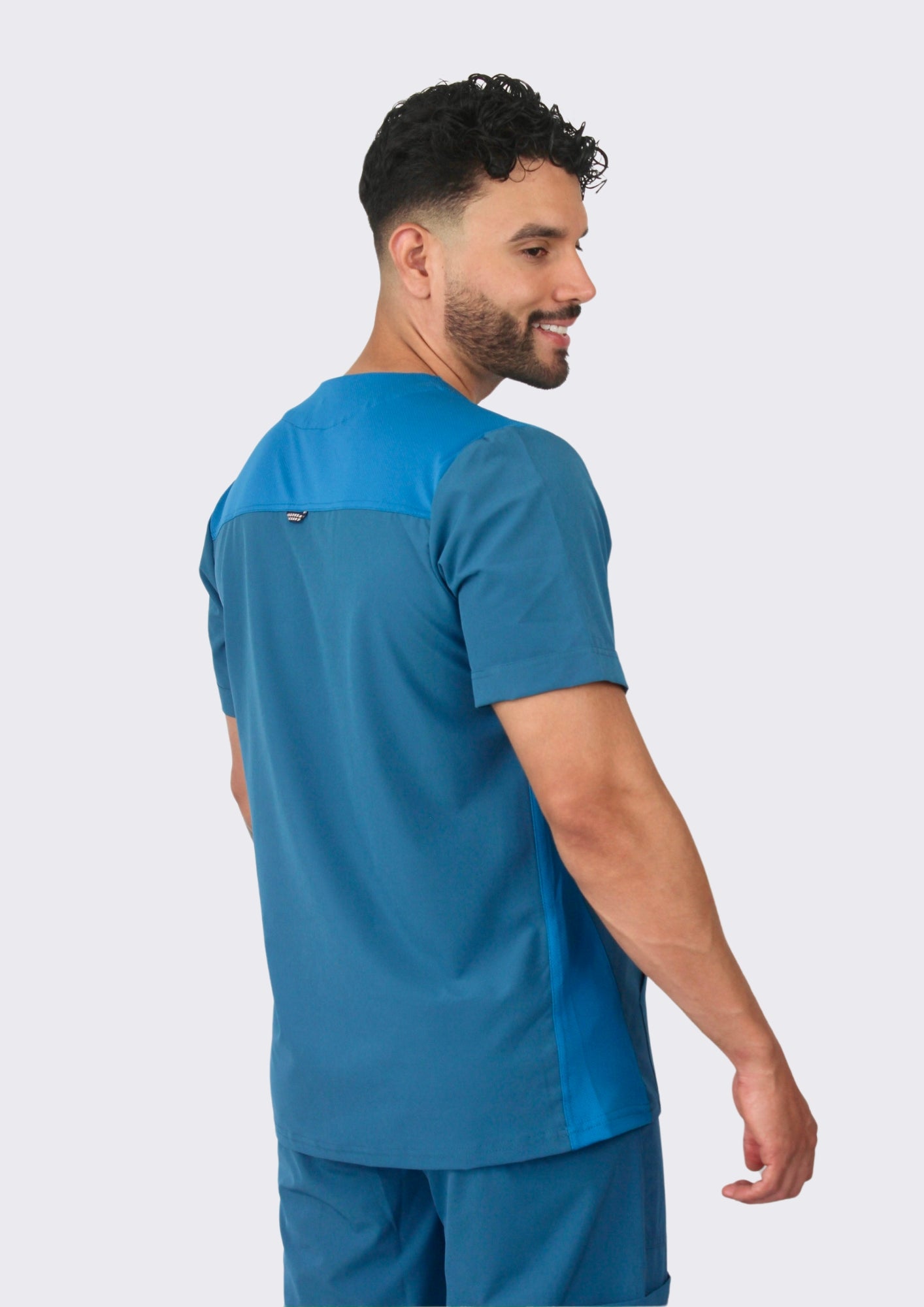 Uniforme New Classic Azul petróleo