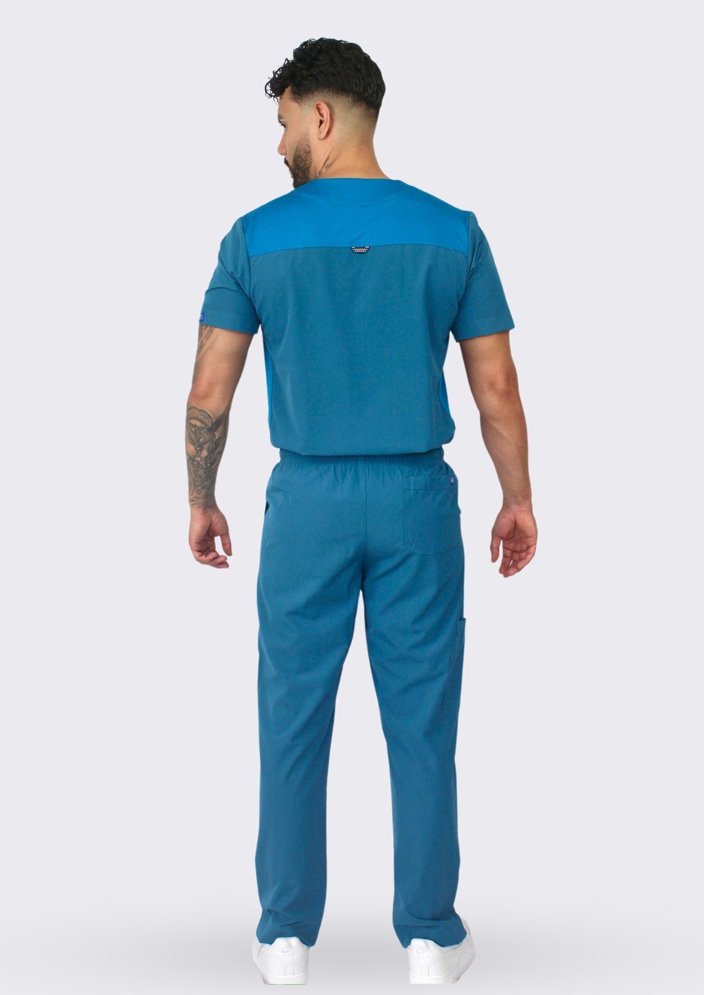 Uniforme New Classic Azul petróleo