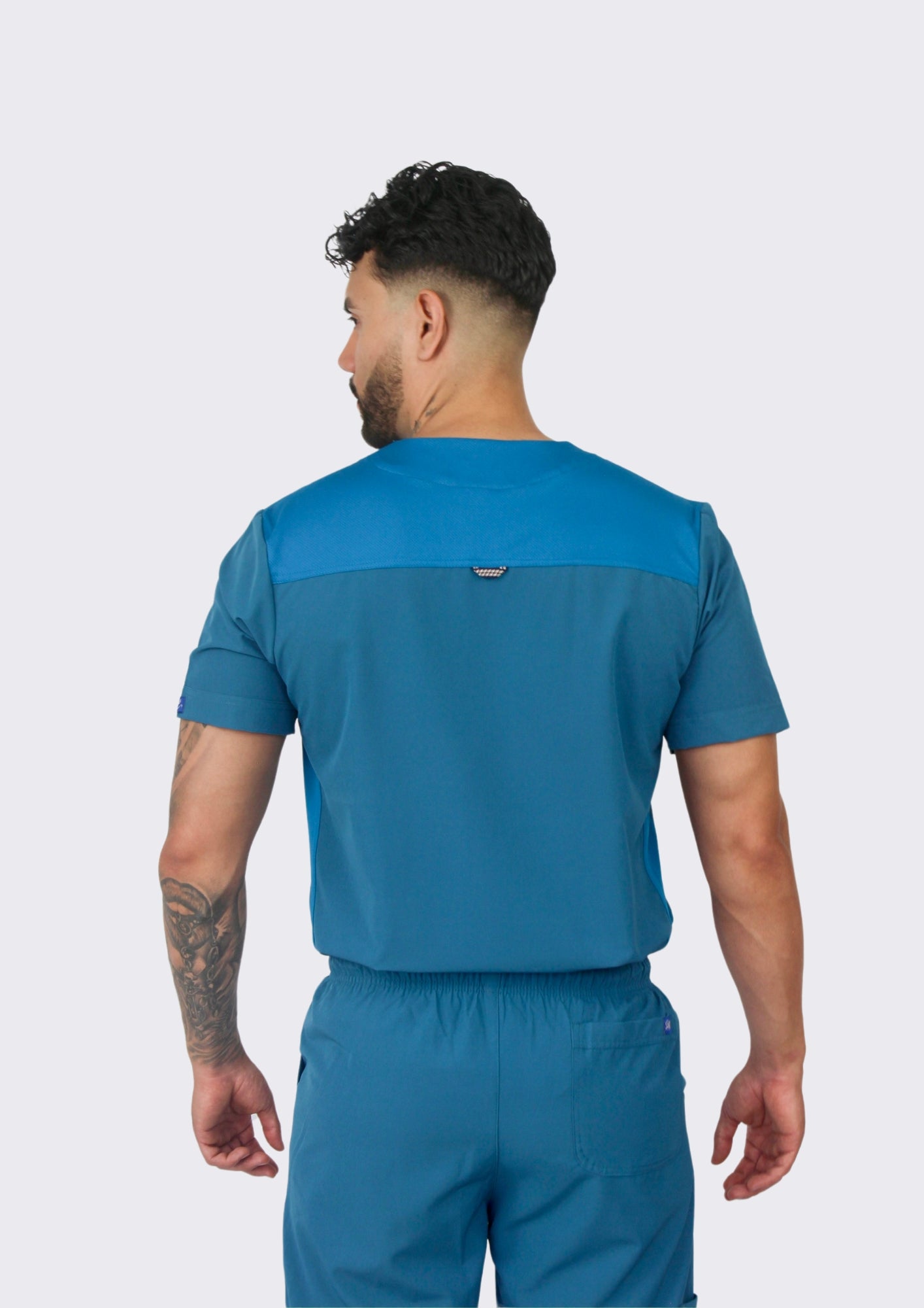 Uniforme New Classic Azul petróleo