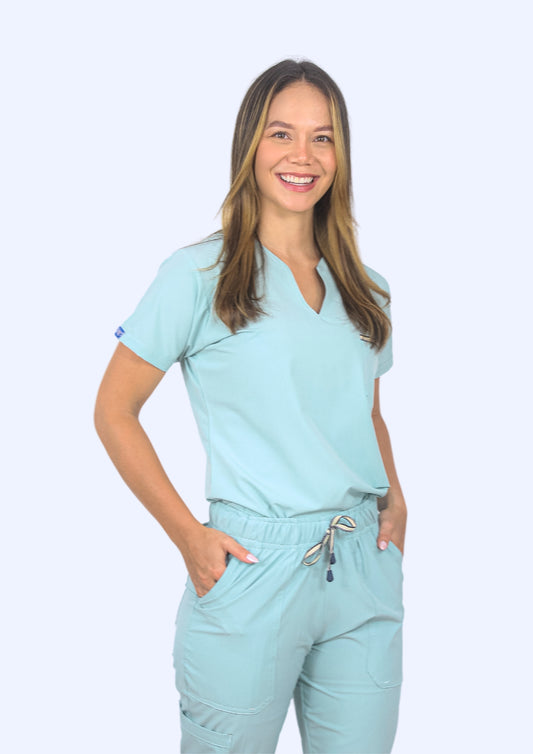 Uniforme Eva verde malva